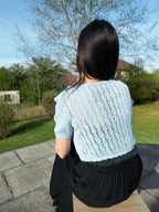 Gilet en crochet bleu ciel
