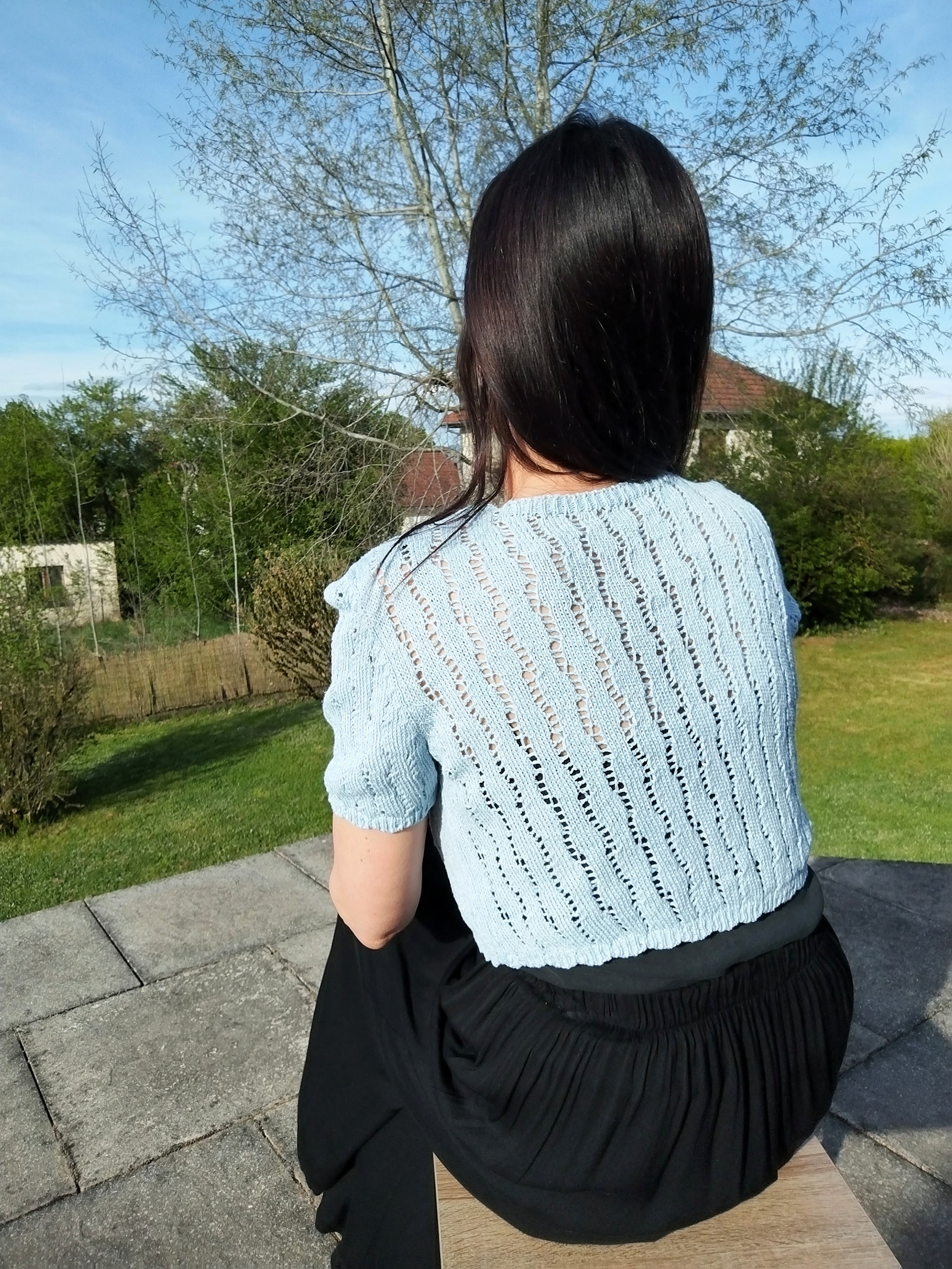 Gilet en crochet bleu ciel